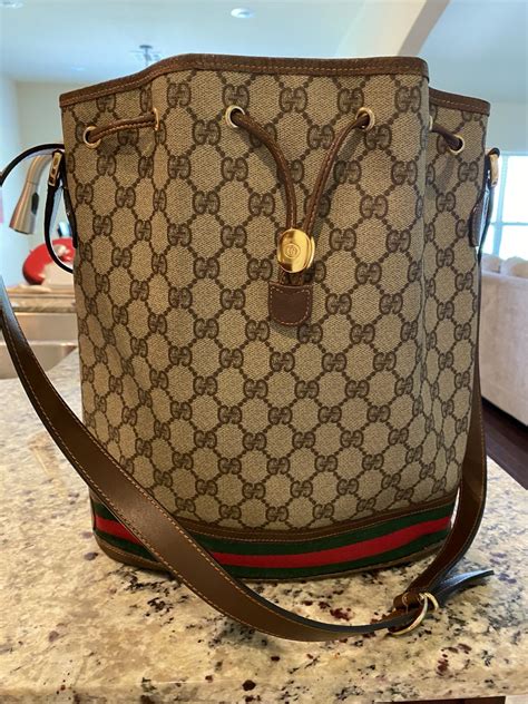 how much does it cost to repair a gucci bag|repairing vintage Gucci handbag.